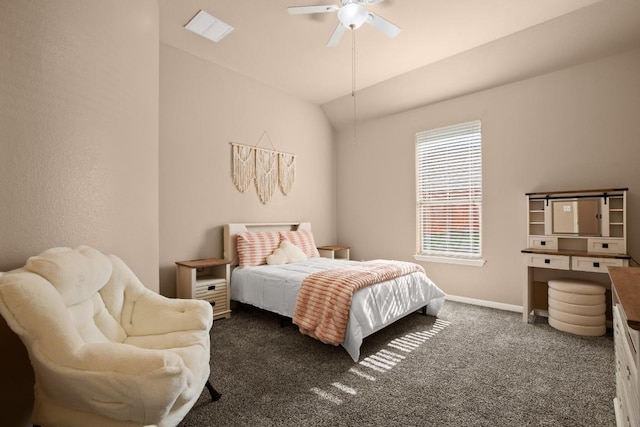 bedroom with dark colored carpet, ceiling fan, and vaulted ceiling