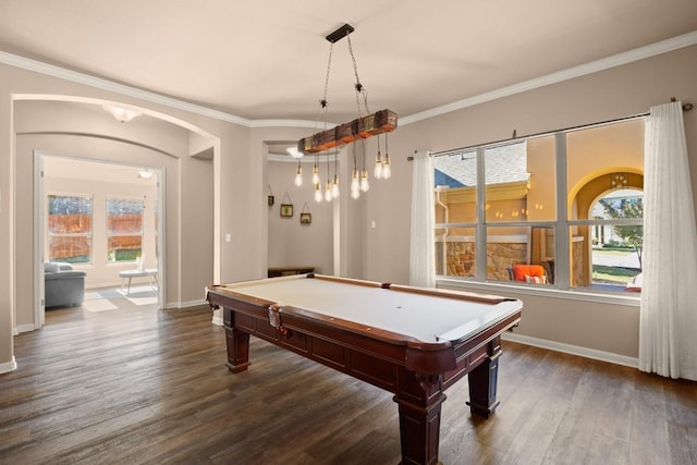 game room featuring plenty of natural light, dark wood-type flooring, and pool table