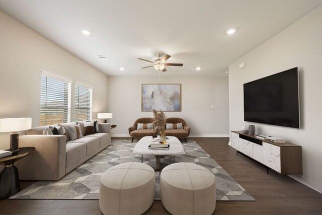 living room with a ceiling fan, recessed lighting, wood finished floors, and baseboards