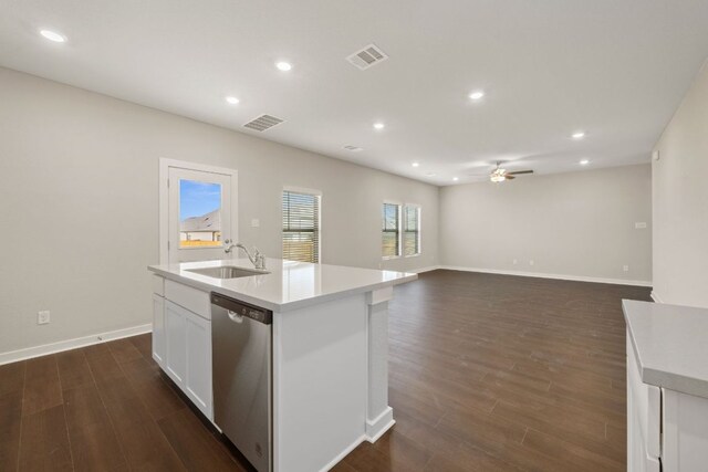 kitchen with dishwasher, a sink, a ceiling fan, dark wood-style flooring, and recessed lighting