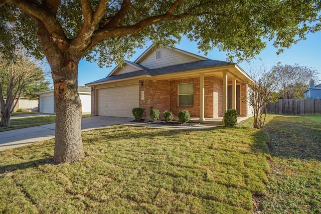 view of front of house featuring a front lawn and a garage