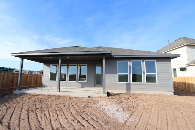 rear view of house featuring a patio area