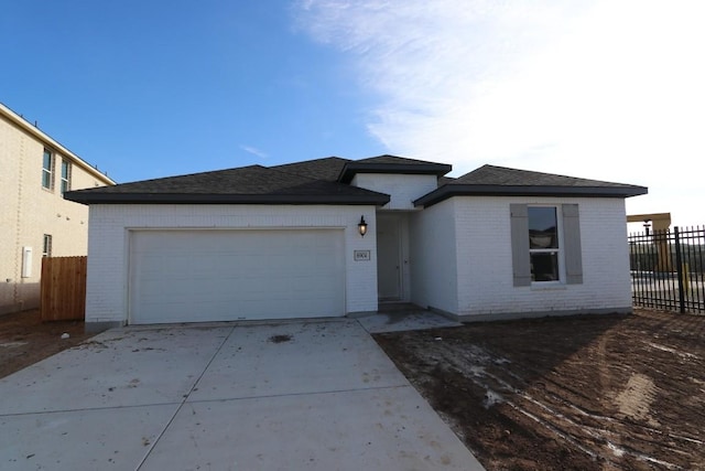 view of front of home with a garage