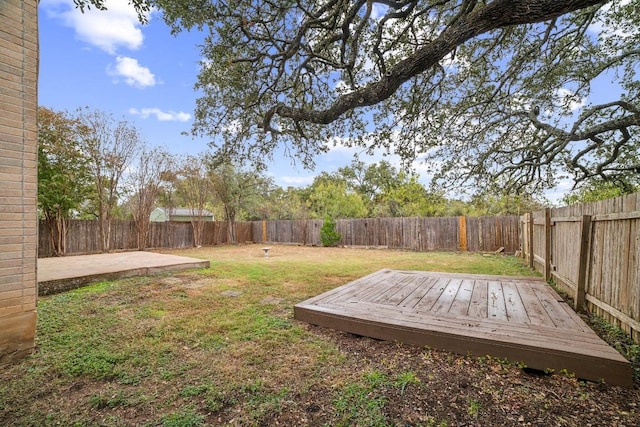 view of yard with a deck