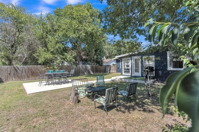 view of yard with a patio area