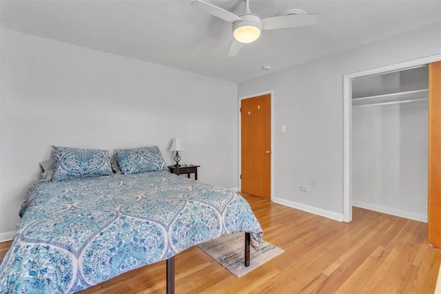 bedroom featuring a closet, ceiling fan, and hardwood / wood-style floors