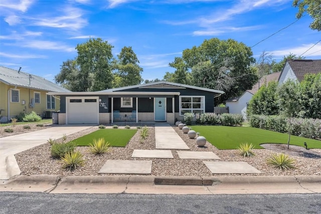 single story home with central AC, a front yard, and a garage