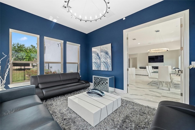 living room with an inviting chandelier