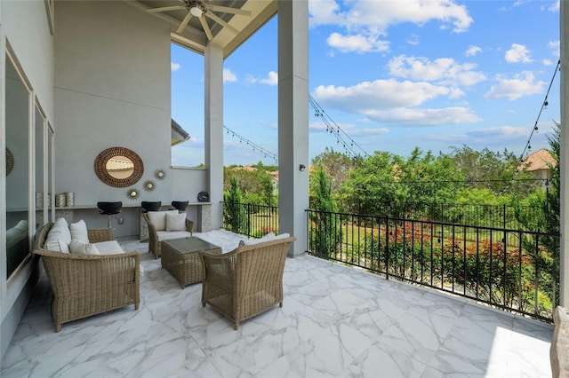 view of patio / terrace featuring outdoor lounge area, an outdoor kitchen, and ceiling fan