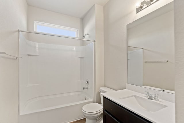 full bathroom featuring vanity,  shower combination, and toilet