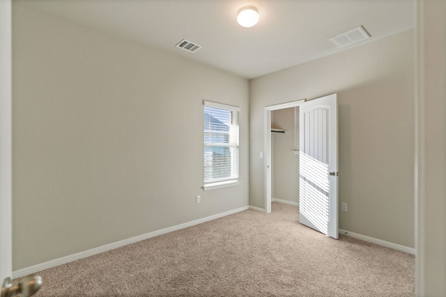 view of carpeted spare room