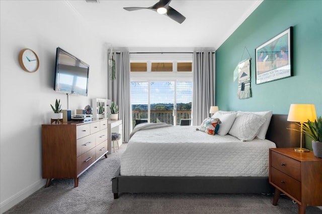 bedroom with ceiling fan, carpet floors, and crown molding