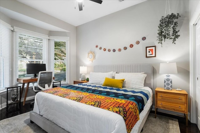 bedroom with hardwood / wood-style flooring and ceiling fan