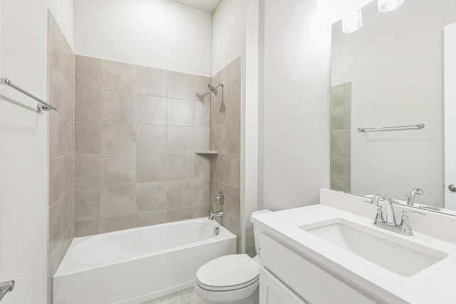 full bathroom featuring shower / bathtub combination, vanity, and toilet