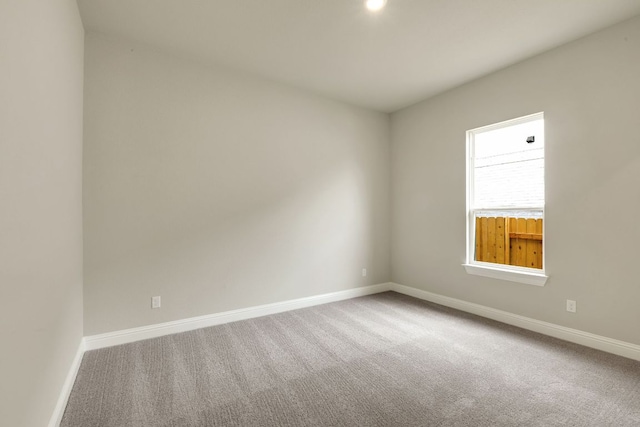 2921 Zuni Path, Leander, TX 78641 - empty room featuring carpet and baseboards