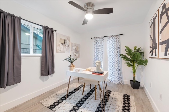 office area featuring ceiling fan and light hardwood / wood-style floors