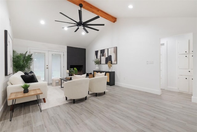 living room featuring high vaulted ceiling, french doors, light hardwood / wood-style flooring, ceiling fan, and beam ceiling