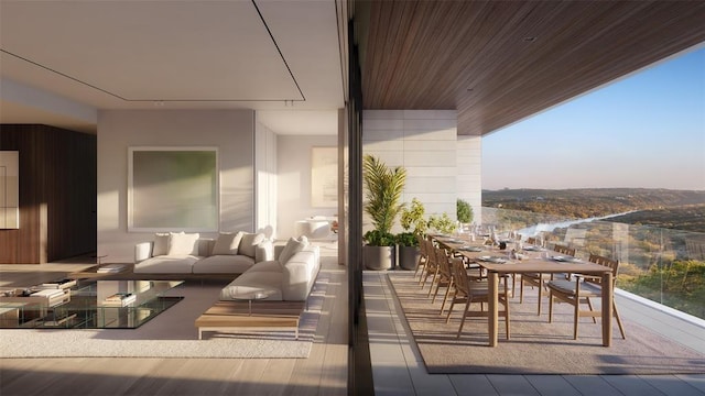 balcony at dusk featuring an outdoor living space