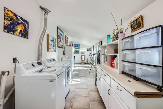 laundry area with separate washer and dryer