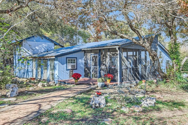 exterior space with a sunroom