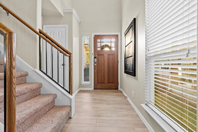 entryway with light hardwood / wood-style floors