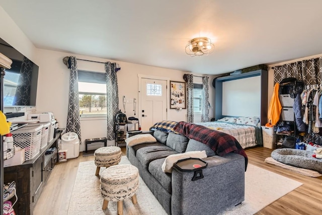 bedroom with light wood-type flooring