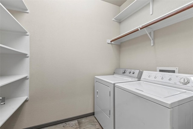 washroom featuring separate washer and dryer