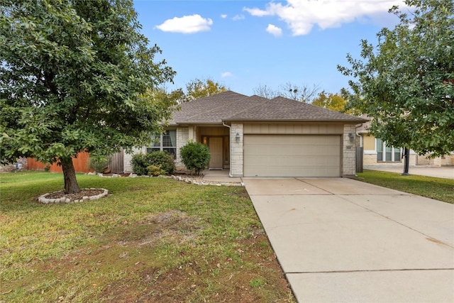 ranch-style house featuring a garage and a front lawn