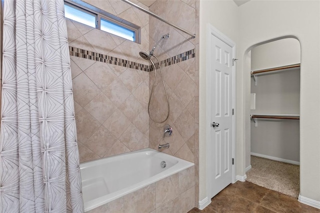 bathroom featuring tile patterned floors and shower / bath combination with curtain