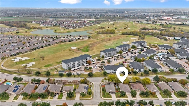 aerial view featuring a water view, a residential view, and golf course view