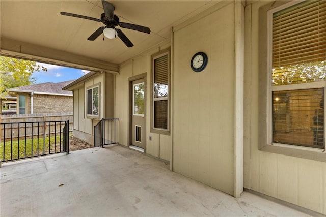 view of patio featuring ceiling fan