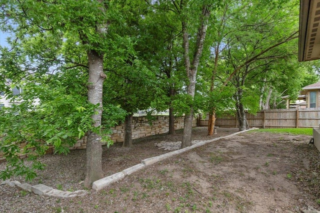 view of yard featuring a fenced backyard