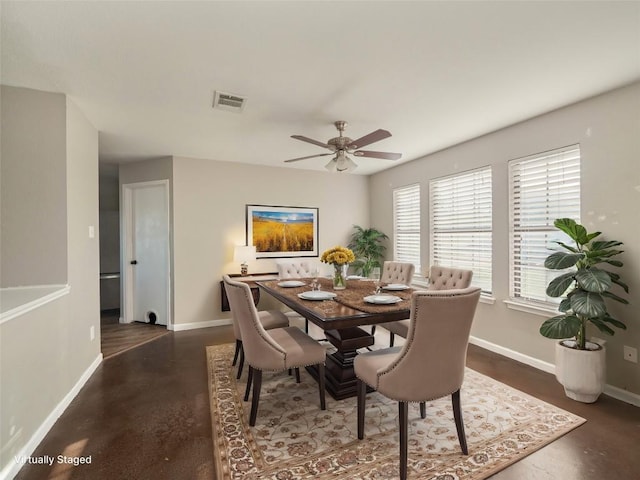 dining room featuring ceiling fan