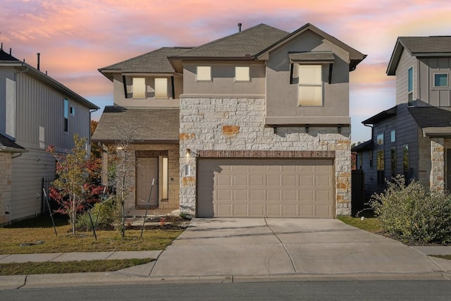 view of front of home with a garage