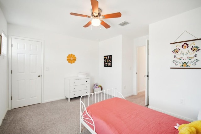 bedroom with light colored carpet and ceiling fan