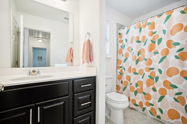 bathroom featuring a shower with curtain, vanity, and toilet