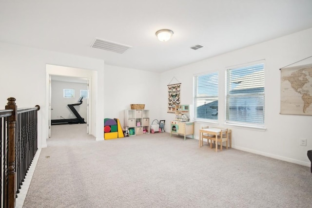 playroom with light colored carpet