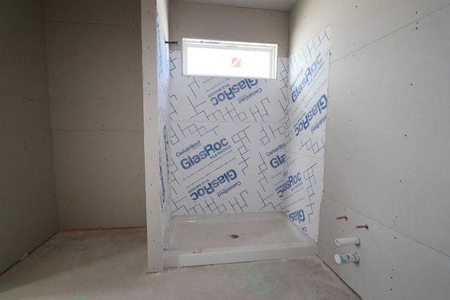 bathroom featuring concrete floors