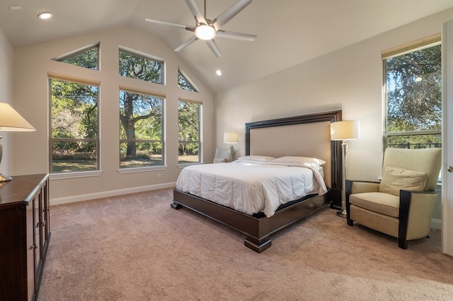 bedroom featuring ceiling fan, lofted ceiling, and light colored carpet