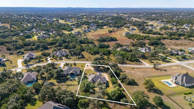 465 Linden Loop, Driftwood, TX 78619 - aerial view of property's location with property parcel outlined and nearby suburban area
