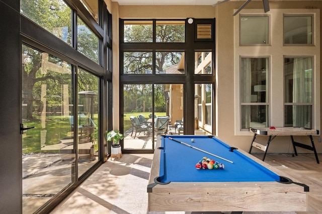 465 Linden Loop, Driftwood, TX 78619 - rec room with healthy amount of natural light, billiards, and a towering ceiling