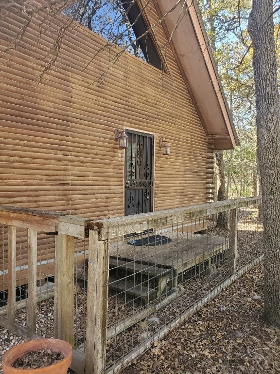 view of home's exterior featuring an outdoor structure