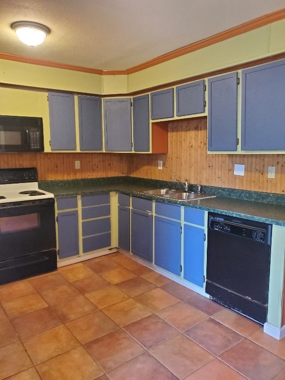 kitchen with blue cabinetry, sink, crown molding, wooden walls, and black appliances