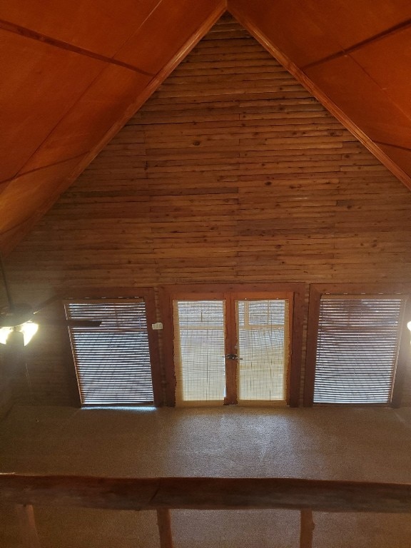 interior details with wood ceiling and wooden walls