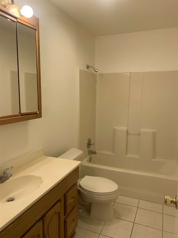 full bathroom with tile patterned flooring, vanity, toilet, and tub / shower combination