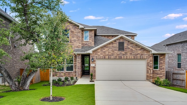 view of front of house with an attached garage, concrete driveway, roof with shingles, and brick siding