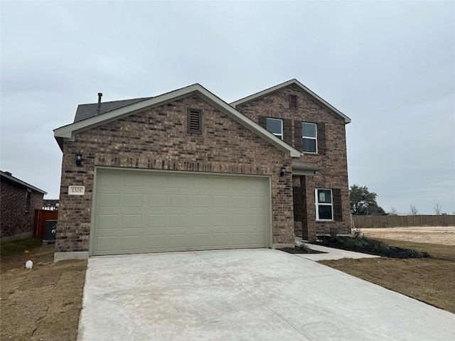 view of front of property featuring a garage