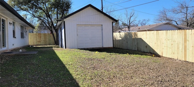 view of yard with a garage and an outdoor structure