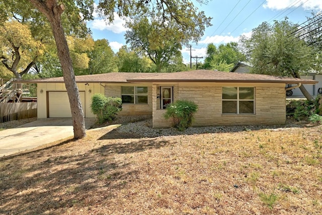 ranch-style home with a garage