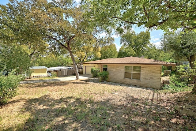 exterior space featuring a garage